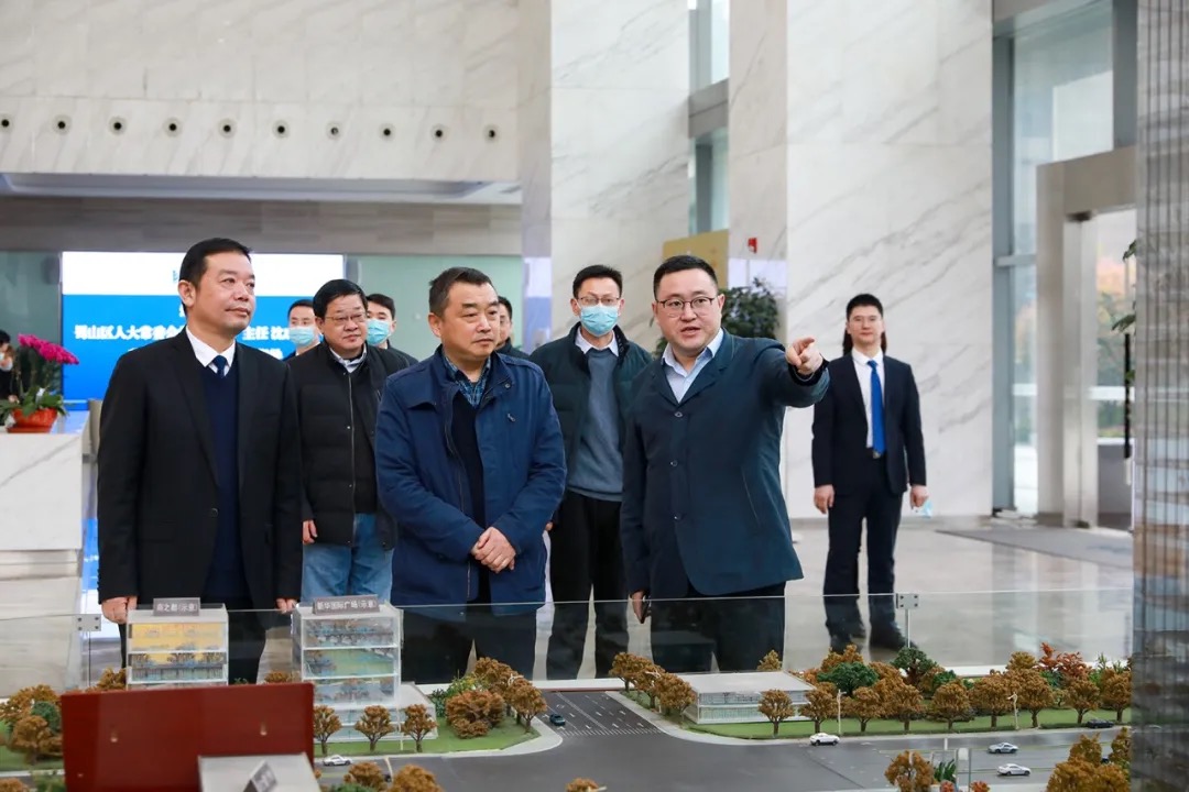 合肥市蜀山區人大常委會主任沈成富一行深入新華控股集團和華地集團調研指導！